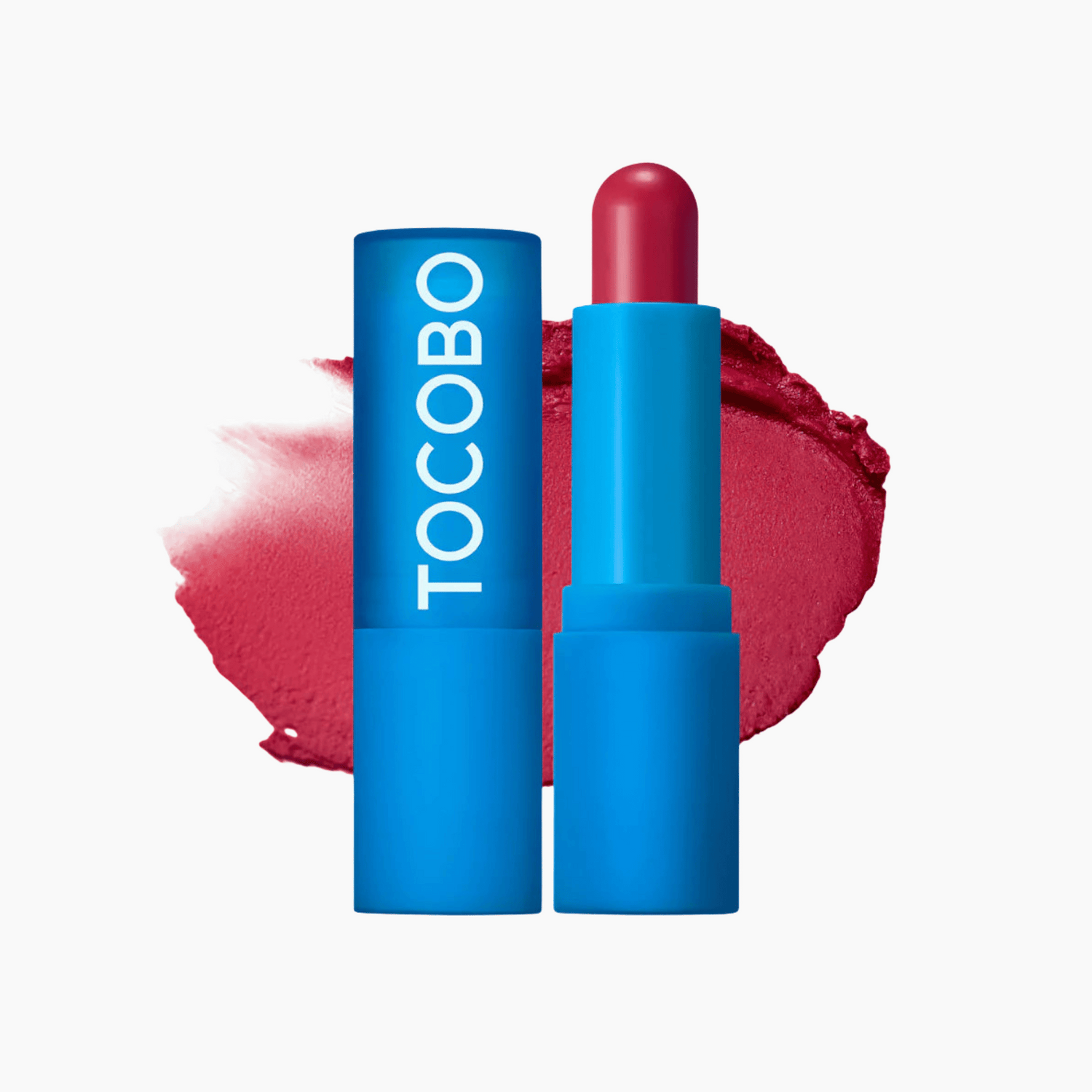Leuchtend blauer Tocobo Lip Balm in Rot geöffnet vor farblich passendem Muster feuchtigkeitsspendende Lippenpflege
