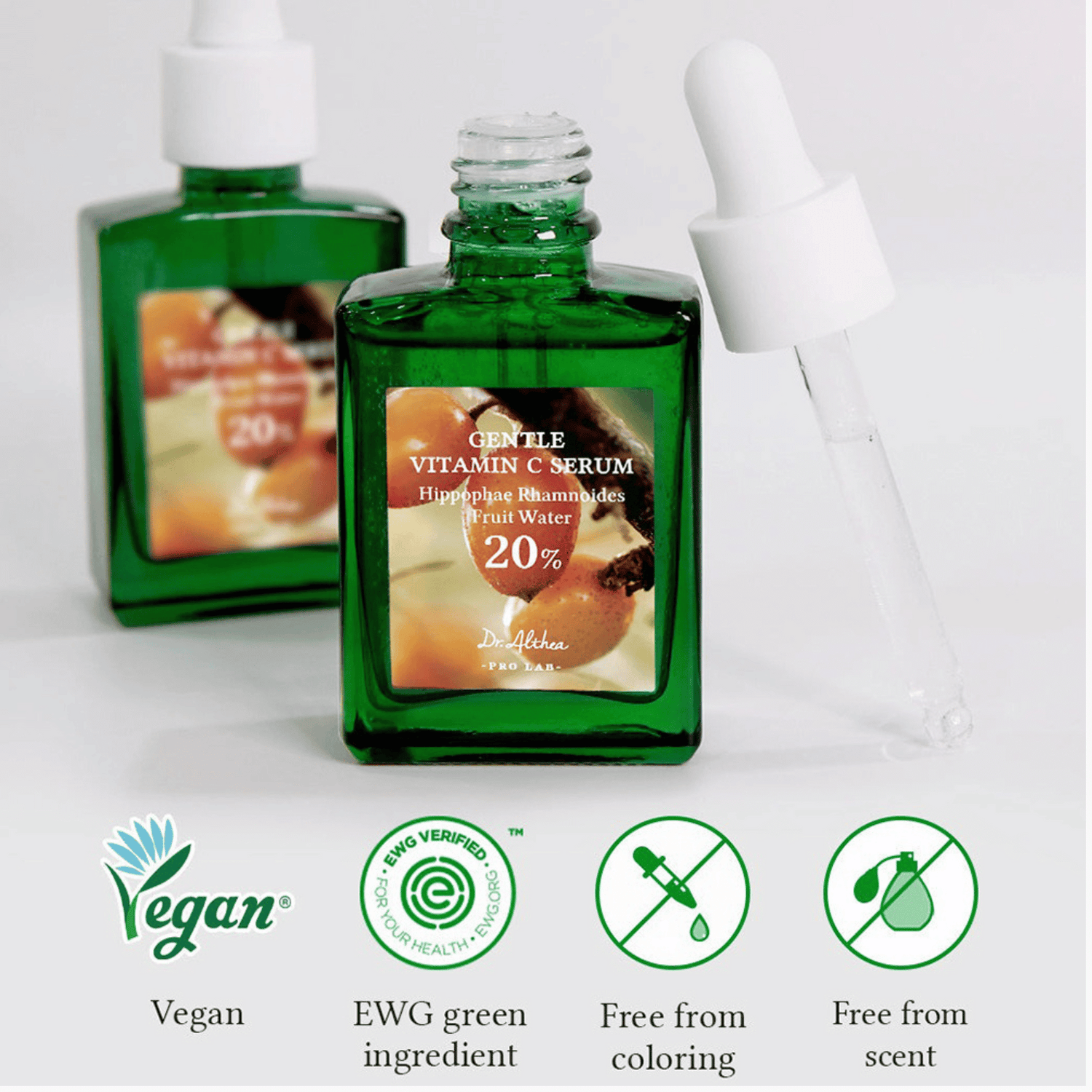 Zwei grüne Glasflaschen mit Pipette antioxidative Pflege, vegan, EWG-geprüft, frei von Farb- und Duftstoffen.