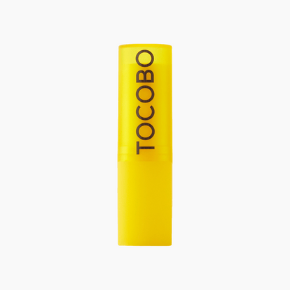 Tocobo Lippenbalsam geschlossen mit gelber Hülse, minimalistisches Design 