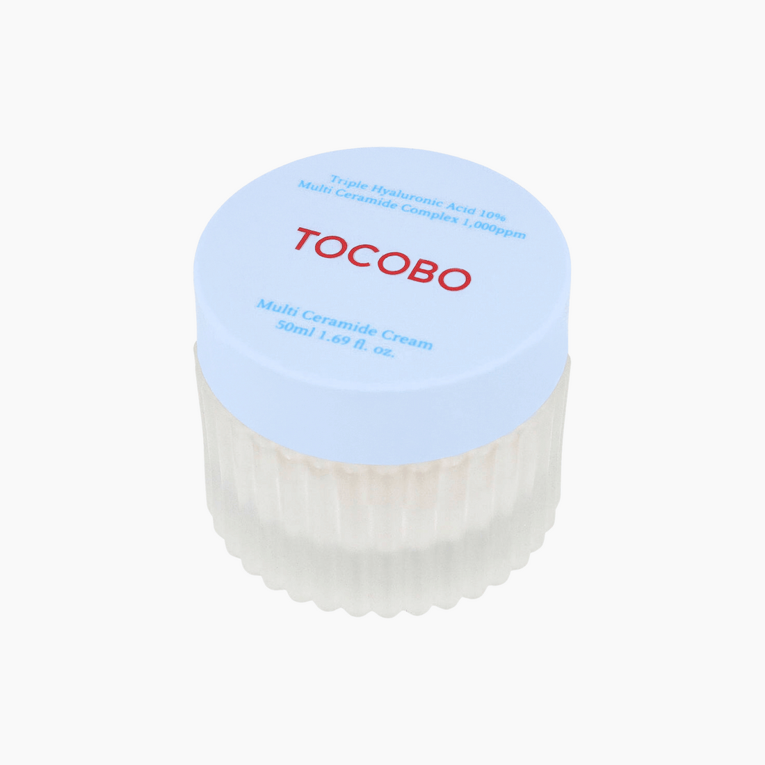 Glasbehälter der Tocobo Multi Ceramide Cream 50ml mit hellblauem Deckel auf weißem Hintergrund